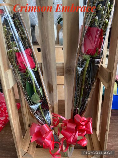 A single Exquisite Rose, delicately wrapped in clear polythene and rich red ribbon. 